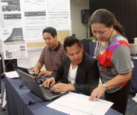 Australian government scholars monitor progress of their development programs